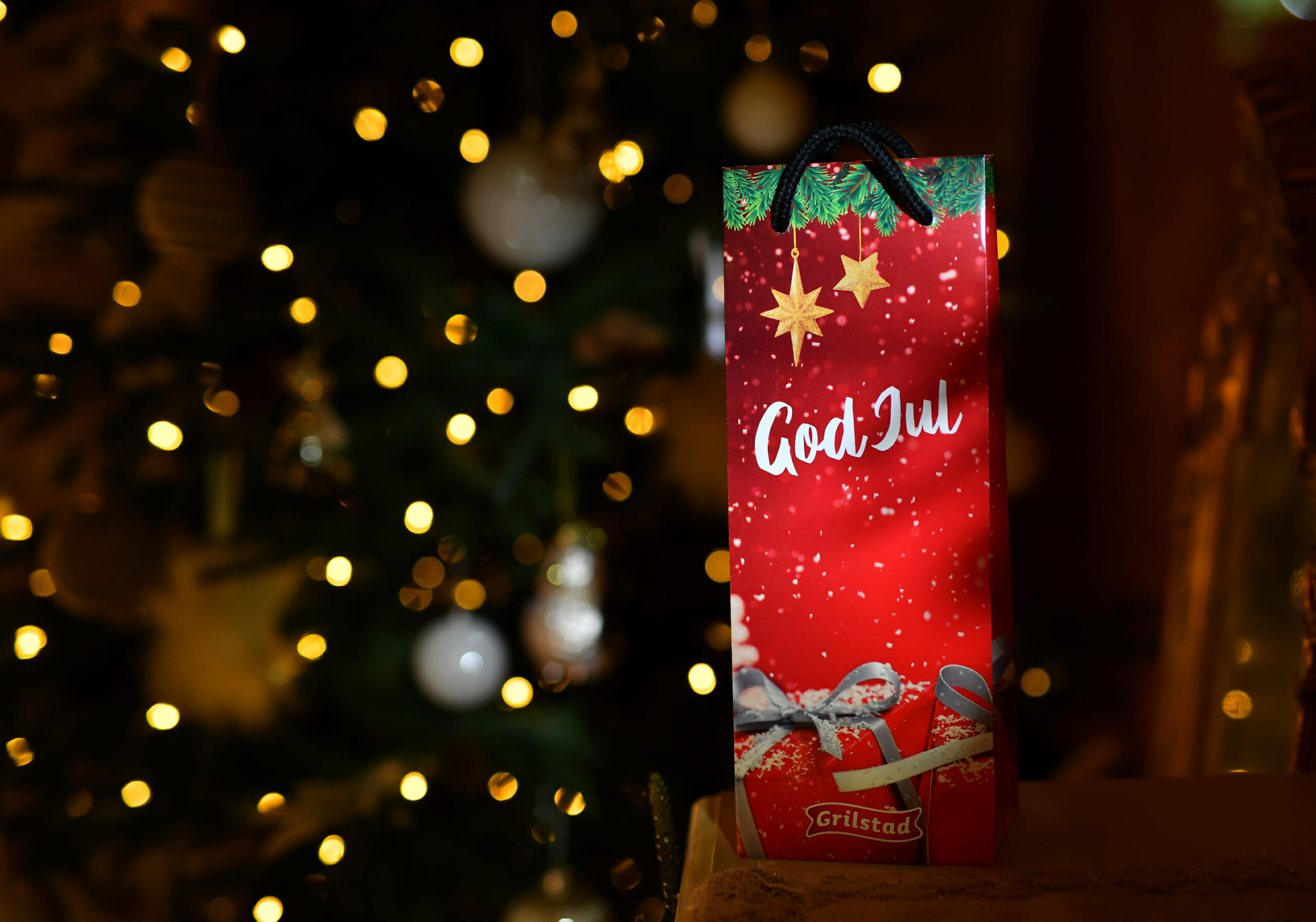 Juleposer og gaveinnpakning - bestill til jul i nettbutikken | SKG - Spesialister innen profilert emballasje